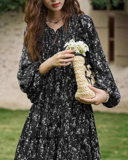 Floral print dress with flare sleeves, knee-length design, and loose, comfortable fit