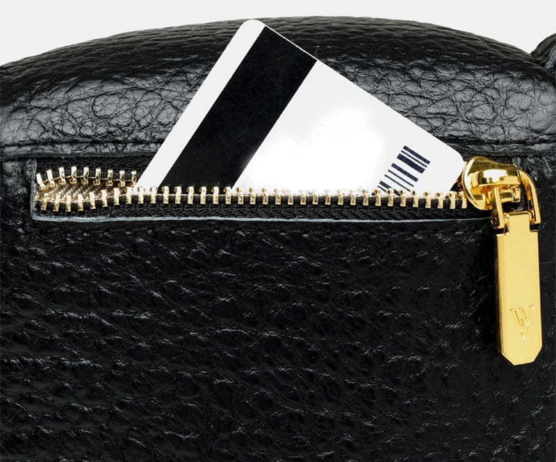 Premium leather crossbody bag with adjustable strap, multiple pockets, and sleek Korean-inspired style
