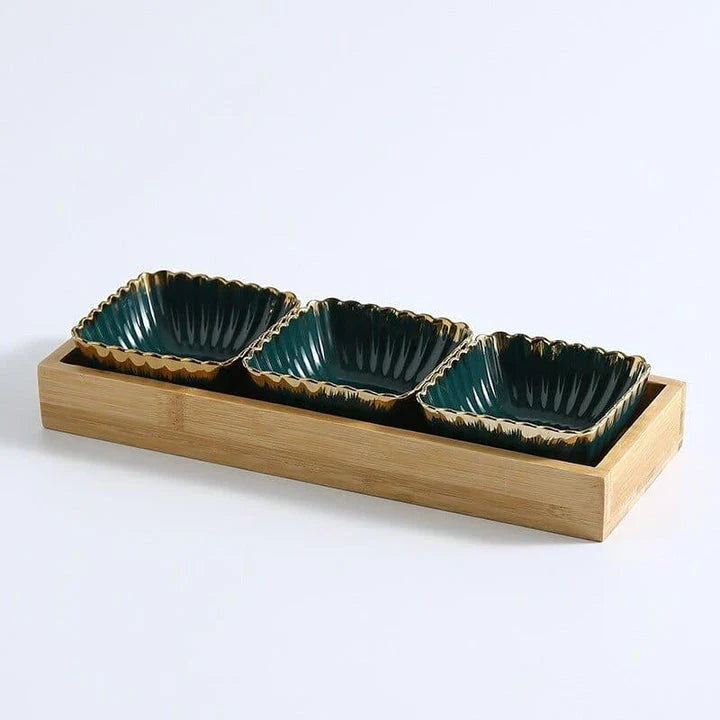Elegant green and gold ceramic serving platter with a wood trim, perfect for hosting and elevating your dining experience.