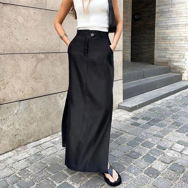 Elegant black ankle-length A-line skirt with functional pockets, made from a premium polyester blend fabric.