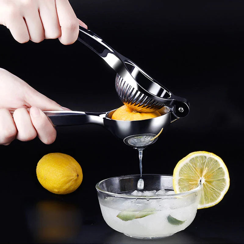 Manual citrus juicer made of stainless steel with an ergonomic handle for easy and efficient juice extraction