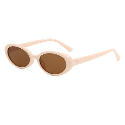 Chic oval sunglasses with white grey acetate frames and polycarbonate lenses, designed for fashionable women to shield their eyes from UV rays in style.