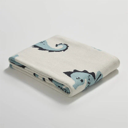 Cozy cotton blanket with cute sea horse design, perfect for relaxation and comfort