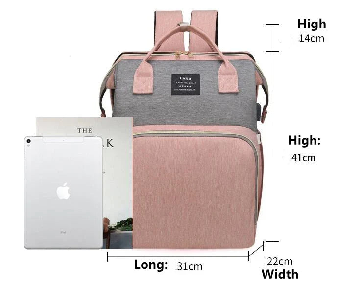 Multifunctional maternity diaper backpack with detachable crib, large capacity, and water-resistant design for travel