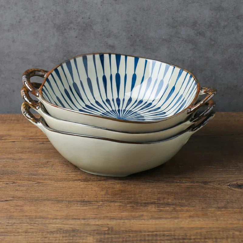 Elegant porcelain noodle and soup bowl with a comfortable handle, perfect for serving a variety of hot and cold dishes.