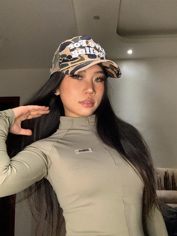 Camo curved brim hat with embroidered 'Live For Feeling' slogan, adjustable size for all-day comfort and style