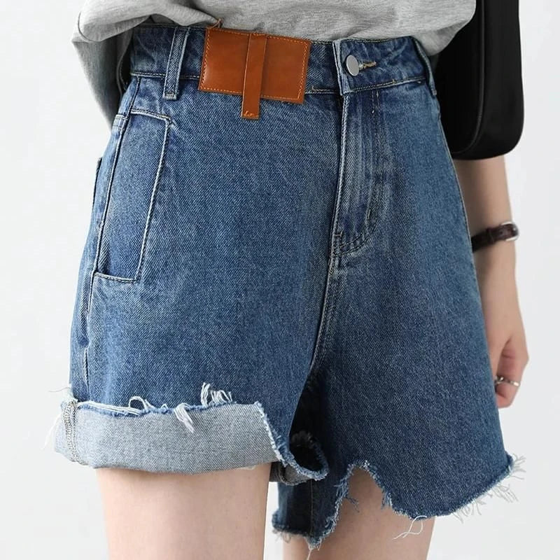 Women's Retro Blue High-Waisted Denim Shorts with Irregularly Cut Design and Cuff Details