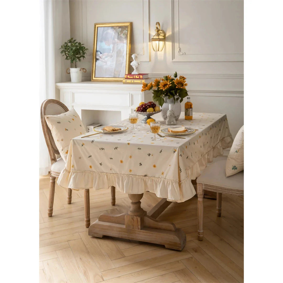 Elegant cotton tablecloth with apricot embroidery and lotus leaf edge, perfect for dining decor