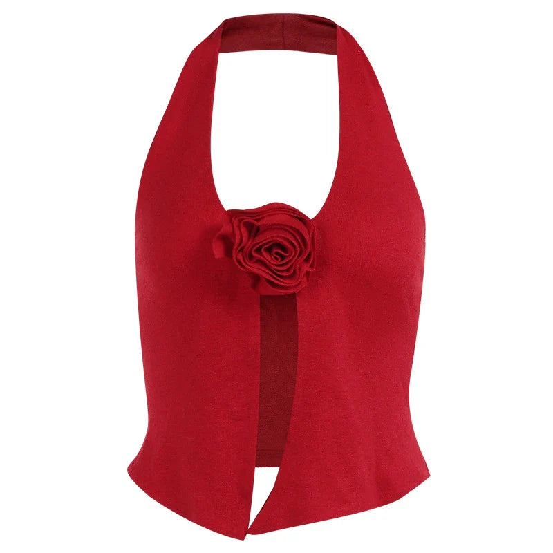Chic knit halter vest with a captivating 3D floral pattern, delivering a trendy and versatile look for any occasion.