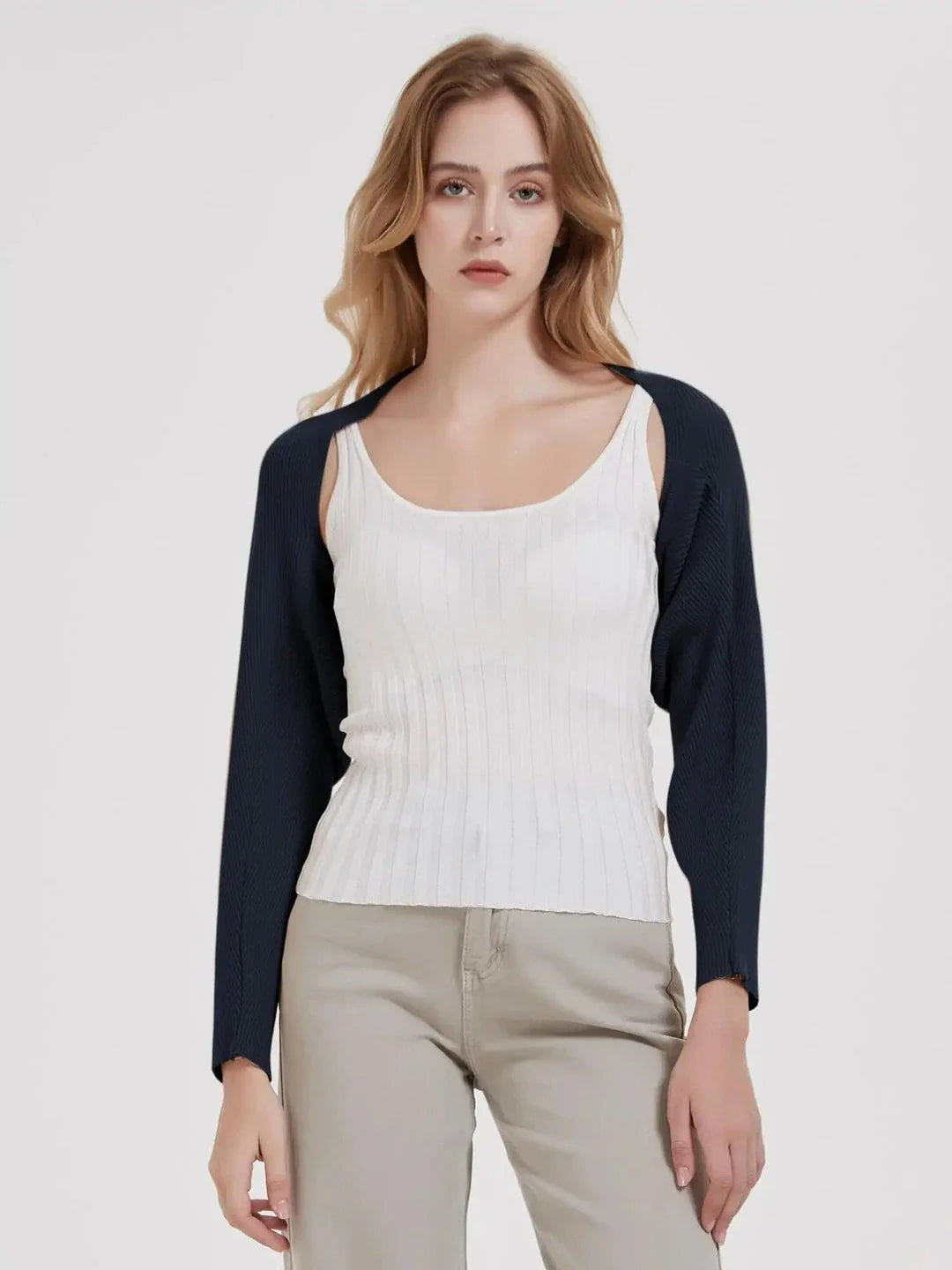 Cozy and chic long sleeve knit crop top cardigan in black, ivory, and camel colors