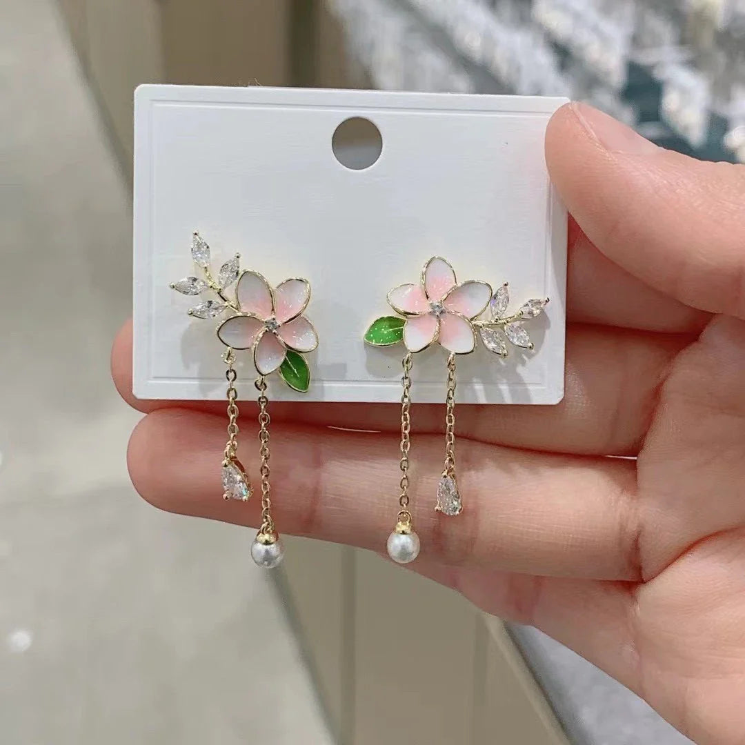 Elegant floral zircon and pearl tassel earrings in gold and silver tones