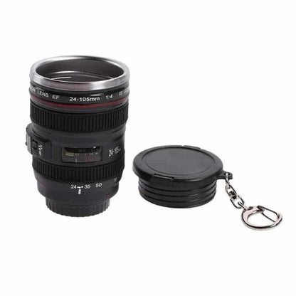 Stylish stainless steel and plastic shot glass with a miniature camera lens design, perfect for adding a unique touch to your home bar or cocktail setup.