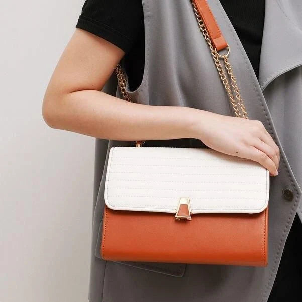 Color Block Quilted Vegan Leather Fashion Shoulder Bag in Orange with Decorative Lock and Chain Detail