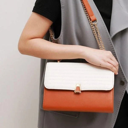 Color Block Quilted Vegan Leather Fashion Shoulder Bag in Orange with Decorative Lock and Chain Detail