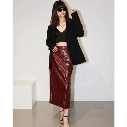 Reflective leather midi pencil skirt with a flattering high-waist design and eye-catching reflective material
