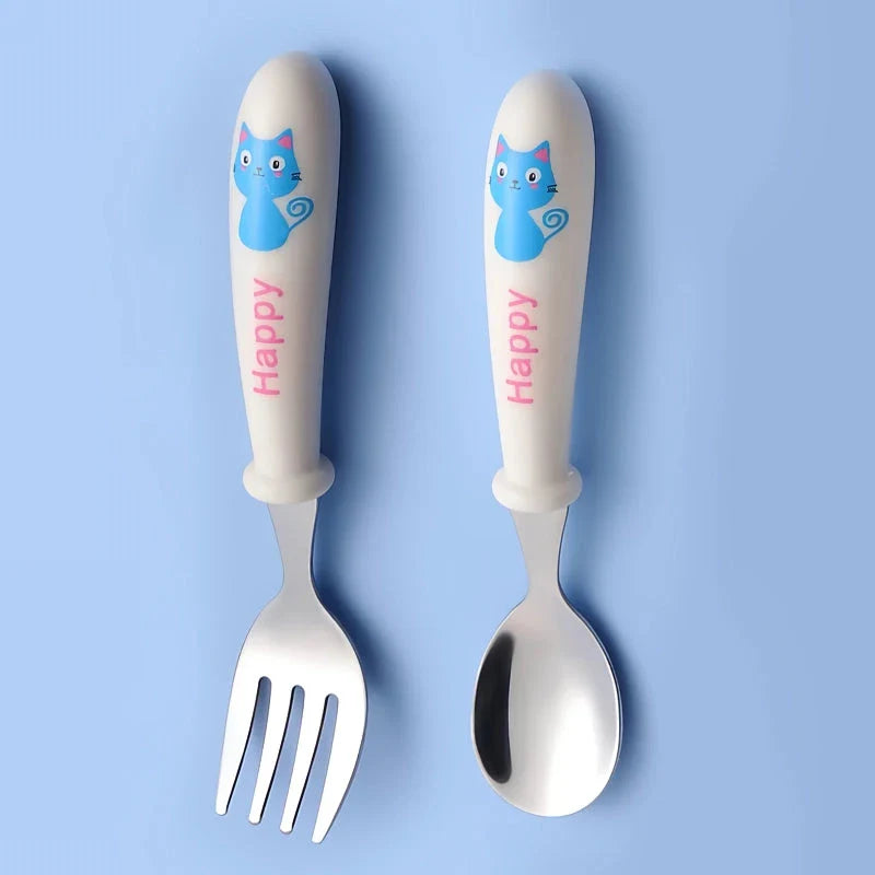 Charming cartoon-designed stainless steel toddler cutlery set with spoon and fork, perfect for mealtimes and self-feeding