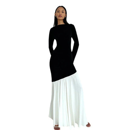 A stylish long sleeve dress with a slim, figure-flattering silhouette and classic round neckline