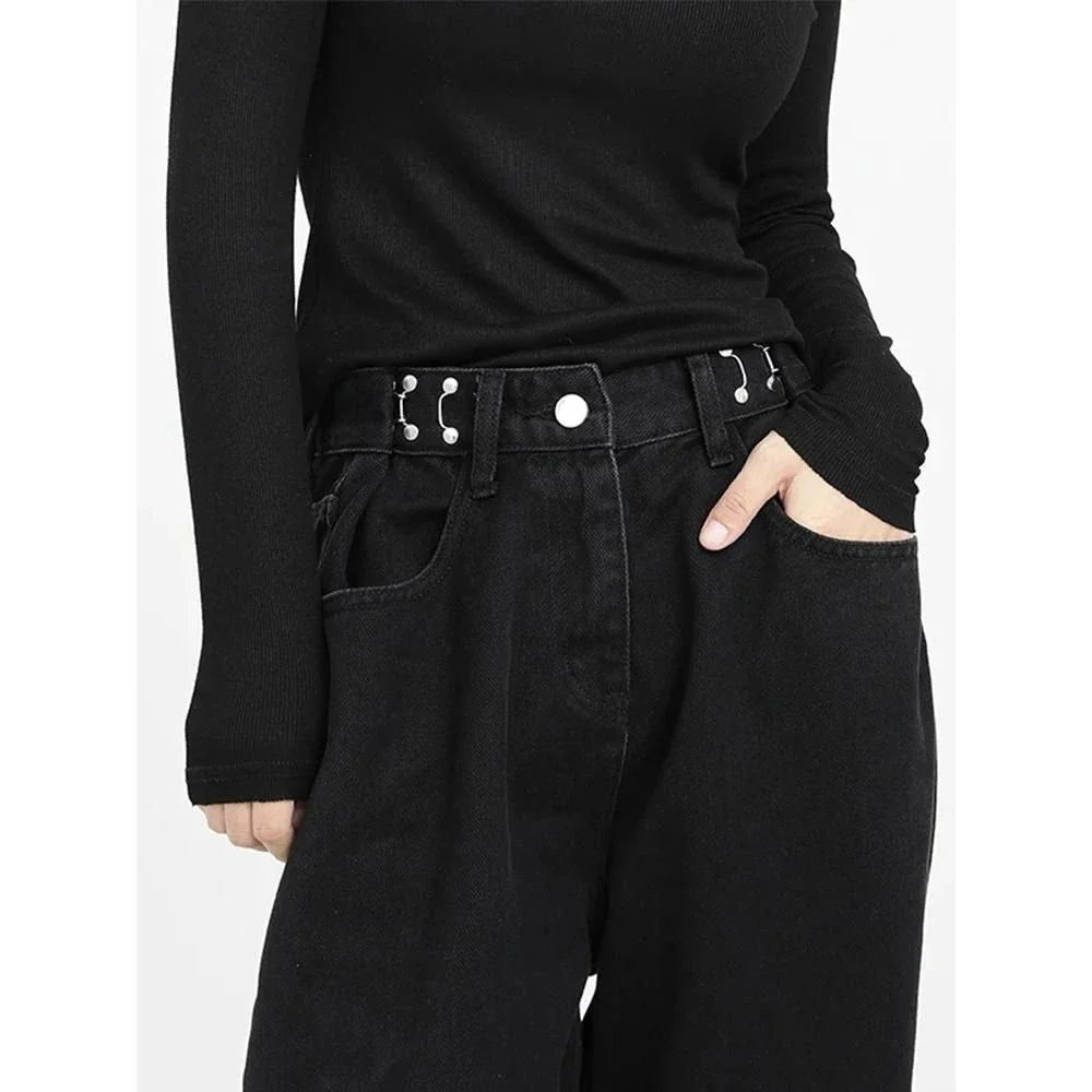 A pair of high-waist black jeans with a relaxed wide-leg design, perfect for effortless style and comfort.