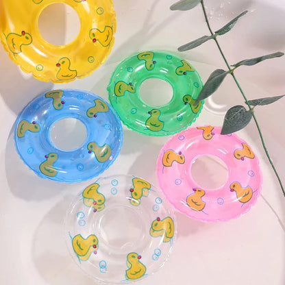 Colorful inflatable swim rings designed to float and entertain children during bath time and pool activities