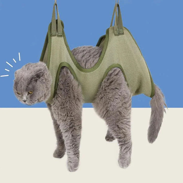 A green cat grooming hammock with a breathable and comfortable design for easy nail trimming, bathing, and grooming.