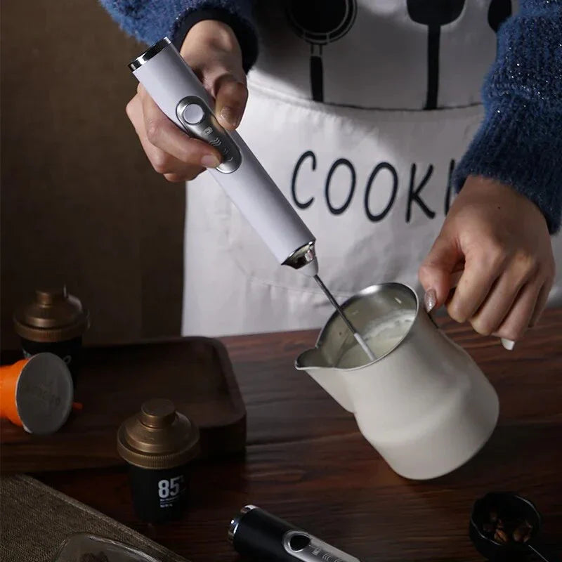 Premium cordless electric milk frother with stainless steel and plastic construction, designed for easy frothing and convenient use.