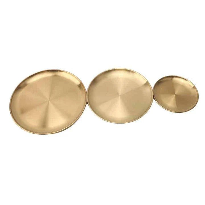 Elegant European-style round dinner plates made of premium stainless steel with a luxurious gold finish
