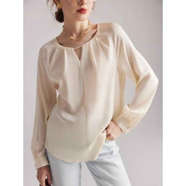 Elegant silk blend raglan sleeve blouse with timeless design and flattering fit for modern women