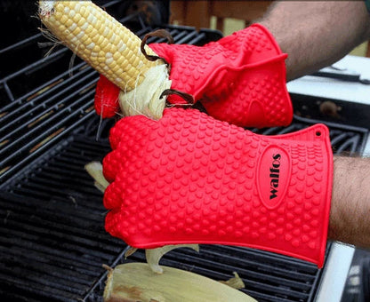 Premium heat-resistant silicone barbecue gloves in pink, designed for safe and comfortable outdoor grilling and cooking