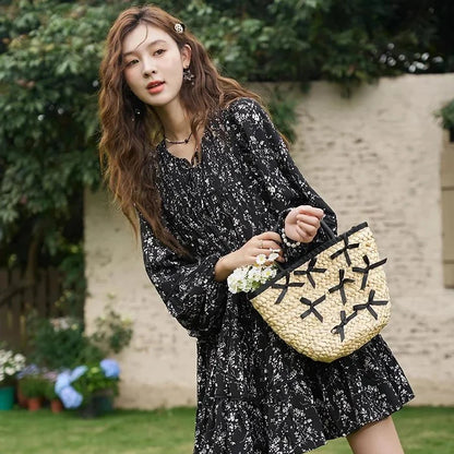 Floral print dress with flare sleeves, knee-length design, and loose, comfortable fit