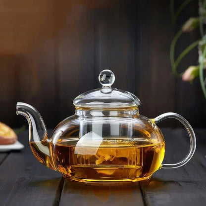 Elegant borosilicate glass flower tea pot with heat-resistant design and crystal clear appearance