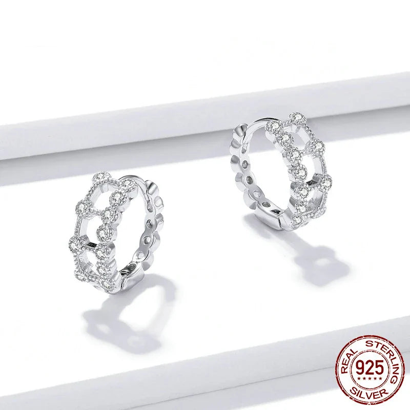 Elegant double-layered electroplated silver earrings with a minimalist, sophisticated design