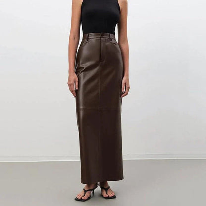 Elegant ankle-length faux leather skirt in vintage brown color, featuring a straight silhouette and empire waistline for a flattering fit.