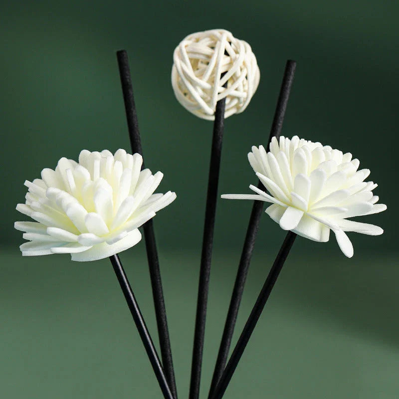 Luxurious jasmine-scented reed diffuser set with decorative plastic flower, providing a soothing and elegant ambiance