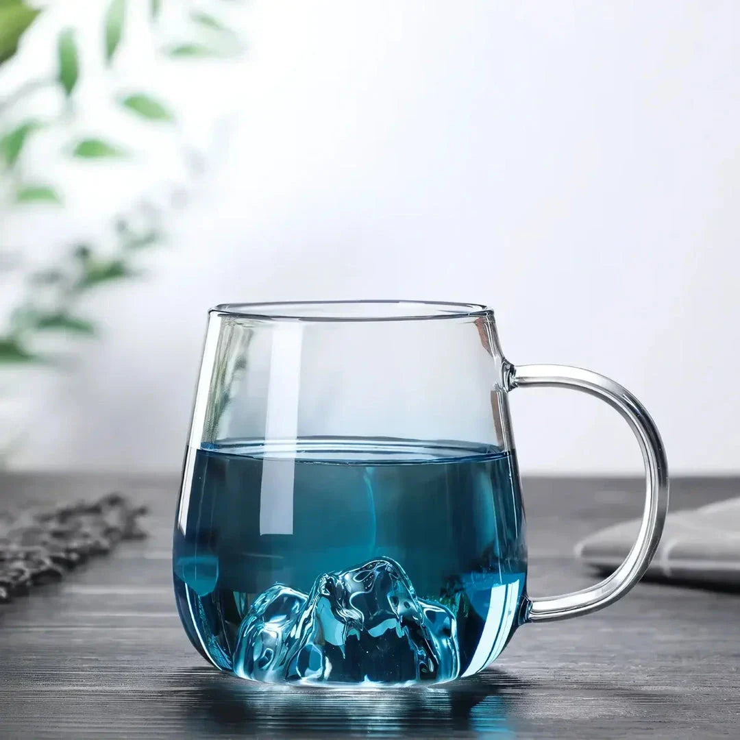 Mountain Gradient Glass Pitcher with a 1800ml capacity and ergonomic handle for serving hot and cold beverages