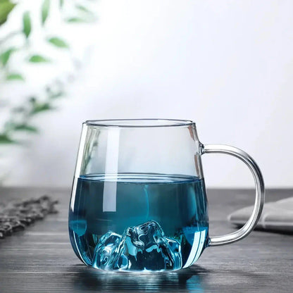 Mountain Gradient Glass Pitcher with a 1800ml capacity and ergonomic handle for serving hot and cold beverages