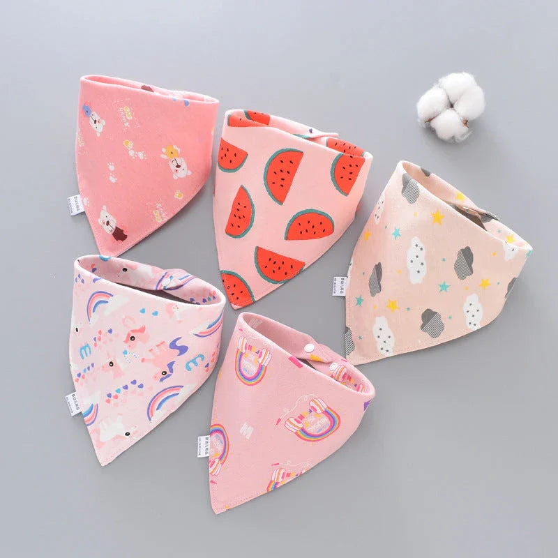 Fashionable cotton baby bandana bibs in various prints, with waterproof backing and adjustable design