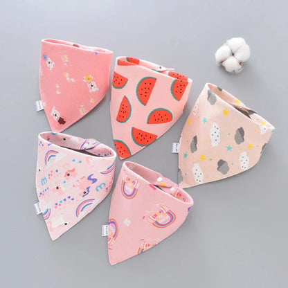 Fashionable cotton baby bandana bibs in various prints, with waterproof backing and adjustable design
