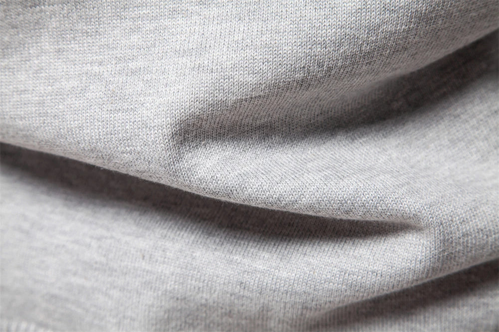 Cozy autumn and winter half-zip sweater in green, dark blue, khaki, and light gray colors