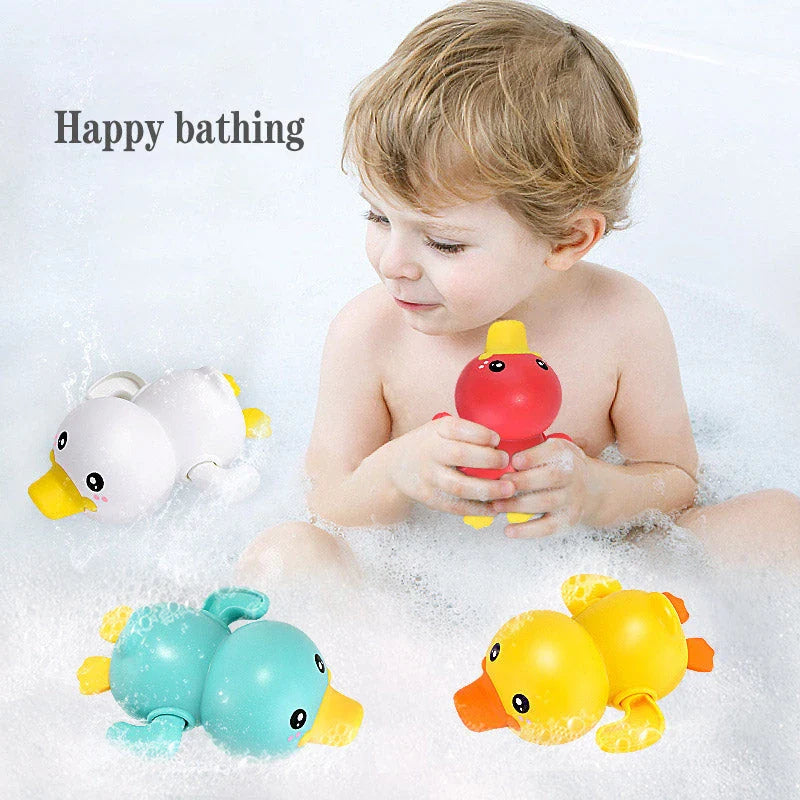 A set of colorful clockwork bathing ducks swimming in the water, providing fun and engaging bath time entertainment for children aged 0-6 years.