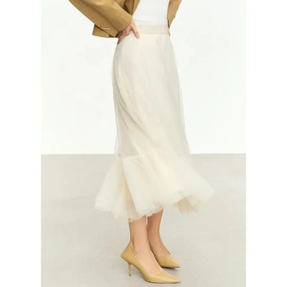 Elegant gauze A-line skirt in beige and white colors, featuring a graceful ankle-length design and unique patchwork detailing for a sophisticated look.