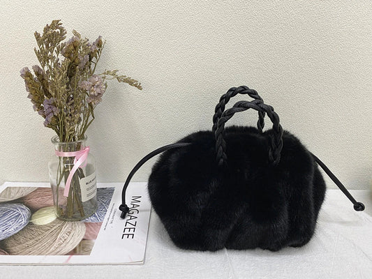 Elegant pleated leather and mink fur handbag in various colors, featuring a chic and modern cloud-like design