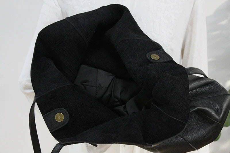 Premium leather handbag with multiple pockets and compartments for exceptional organization and style