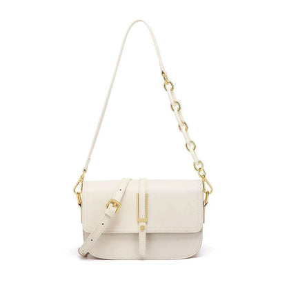 Elegant white leather crossbody bag for women with adjustable strap and multiple interior pockets for organized storage.