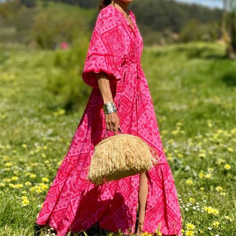 A vibrant red Bohemian-style dress with a geometric print pattern, featuring a mid-length, flattering silhouette and stretchy, comfortable Spandex fabric