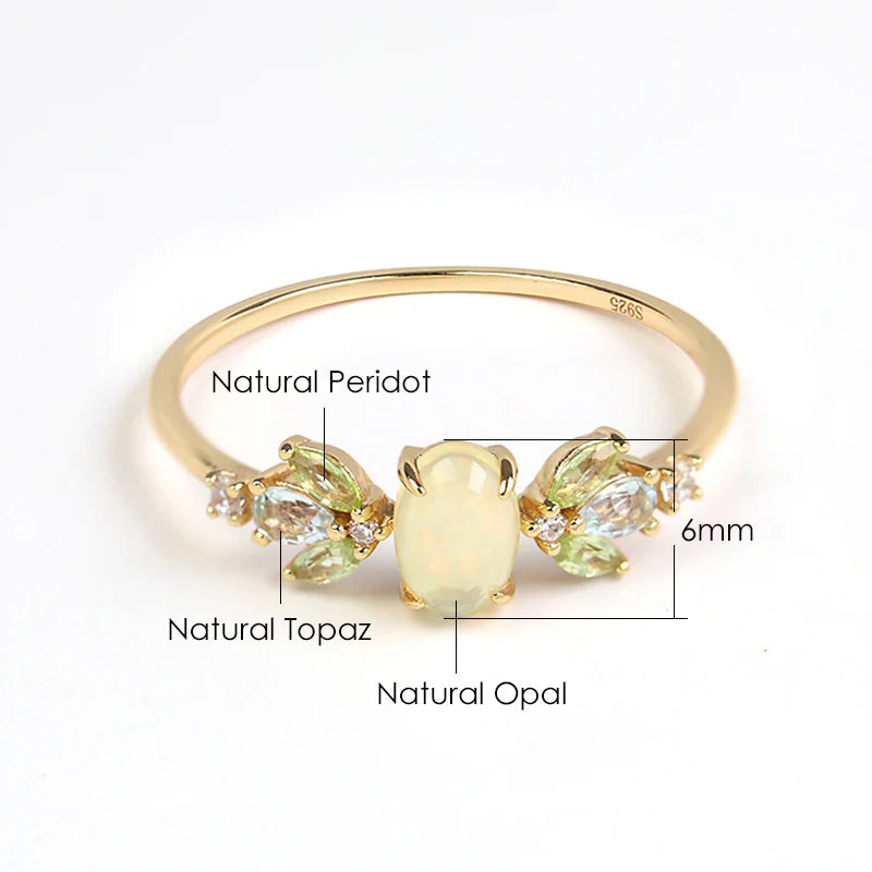 Sterling silver ring featuring a natural opal gemstone in a modern geometric design