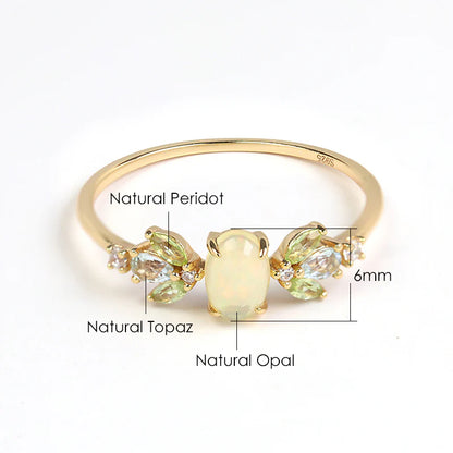 Sterling silver ring featuring a natural opal gemstone in a modern geometric design