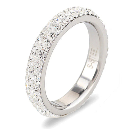 A personalized couple's ring made of stainless steel and adorned with sparkling rhinestones, symbolizing the beauty of your love story.