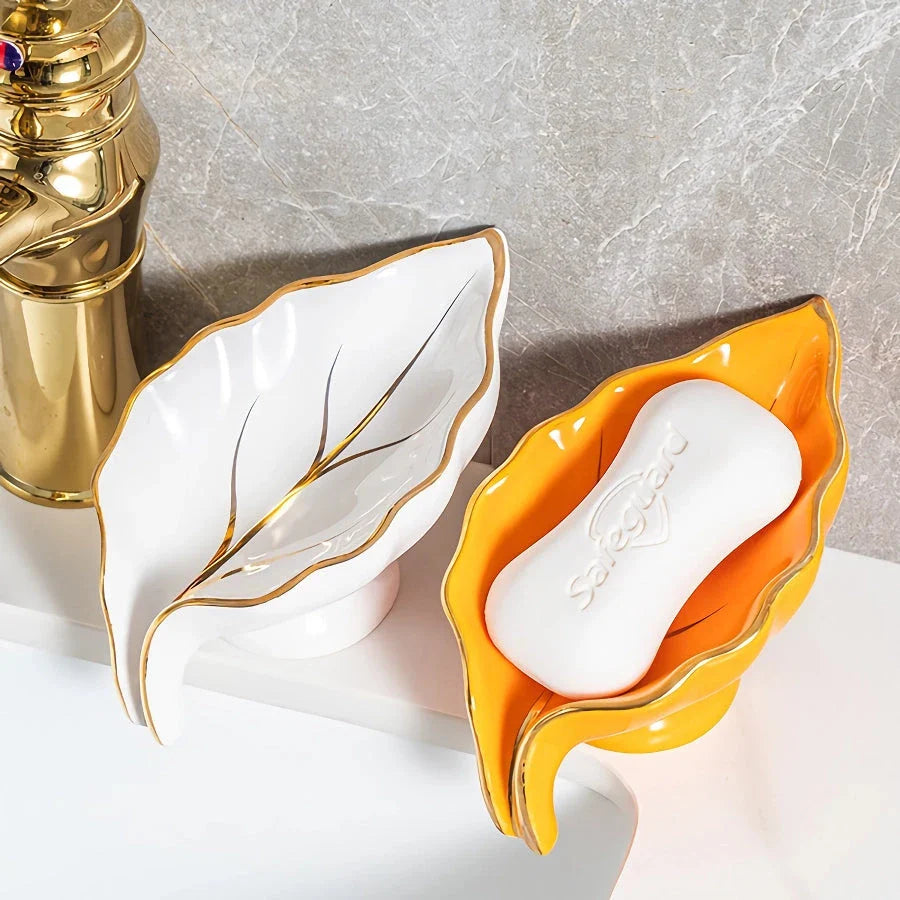 Elegant ceramic leaf-shaped soap dish with a heart design, perfect for adding a touch of nature-inspired luxury to your bathroom decor