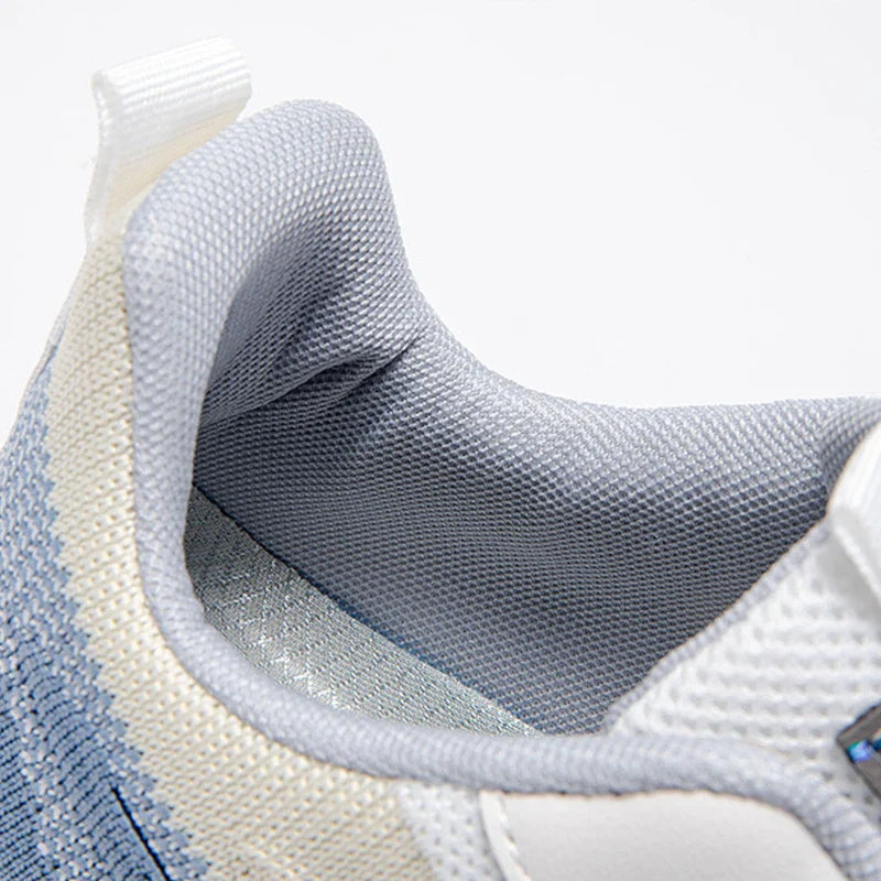 Breathable, comfortable color-blocked mesh sneakers for men with a durable rubber sole and secure lace-up closure