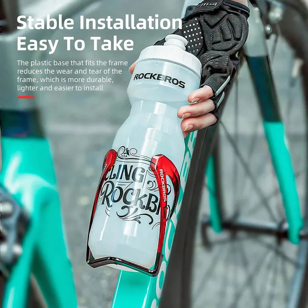 A stylish, lightweight cycling bottle holder with a two-tone design, securely holding a water bottle on a bike.